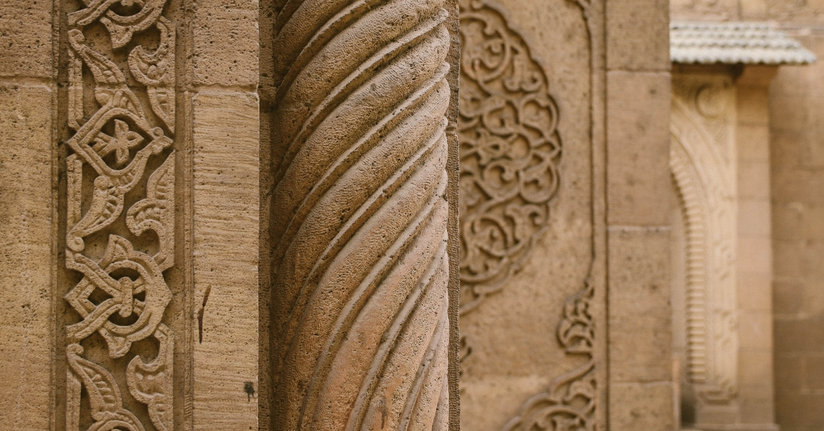 Wall decoration ideas in Pakistan featuring calligraphy art and modern wall panels.