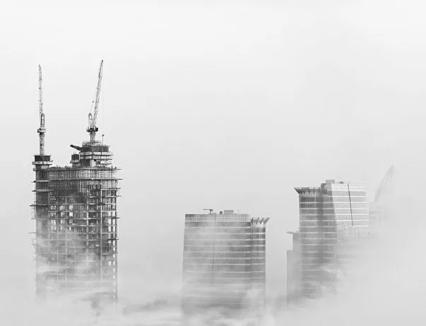 Construction building with cloud fog
