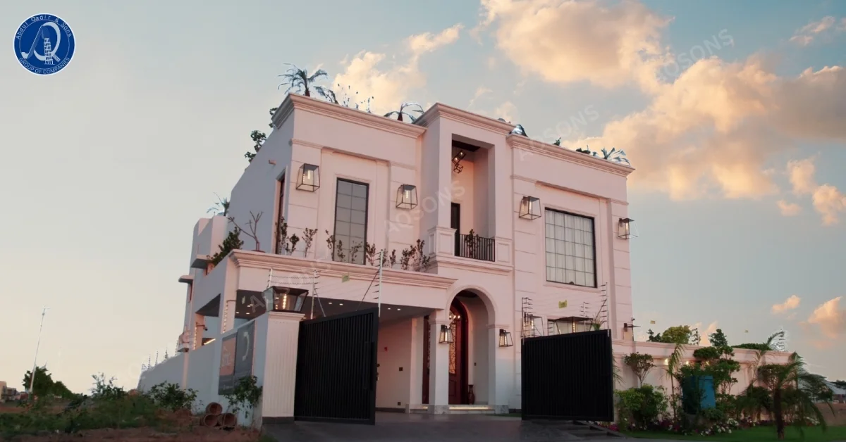 Front elevation of a 1 Kanal Classic House Plan featuring a grand double-story design with arched entrance, large windows, and soft exterior tones ideal for luxury family living in Pakistan.