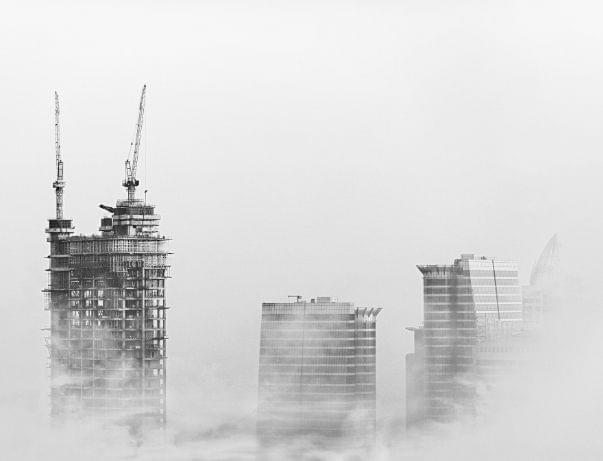 Construction building with cloud fog
